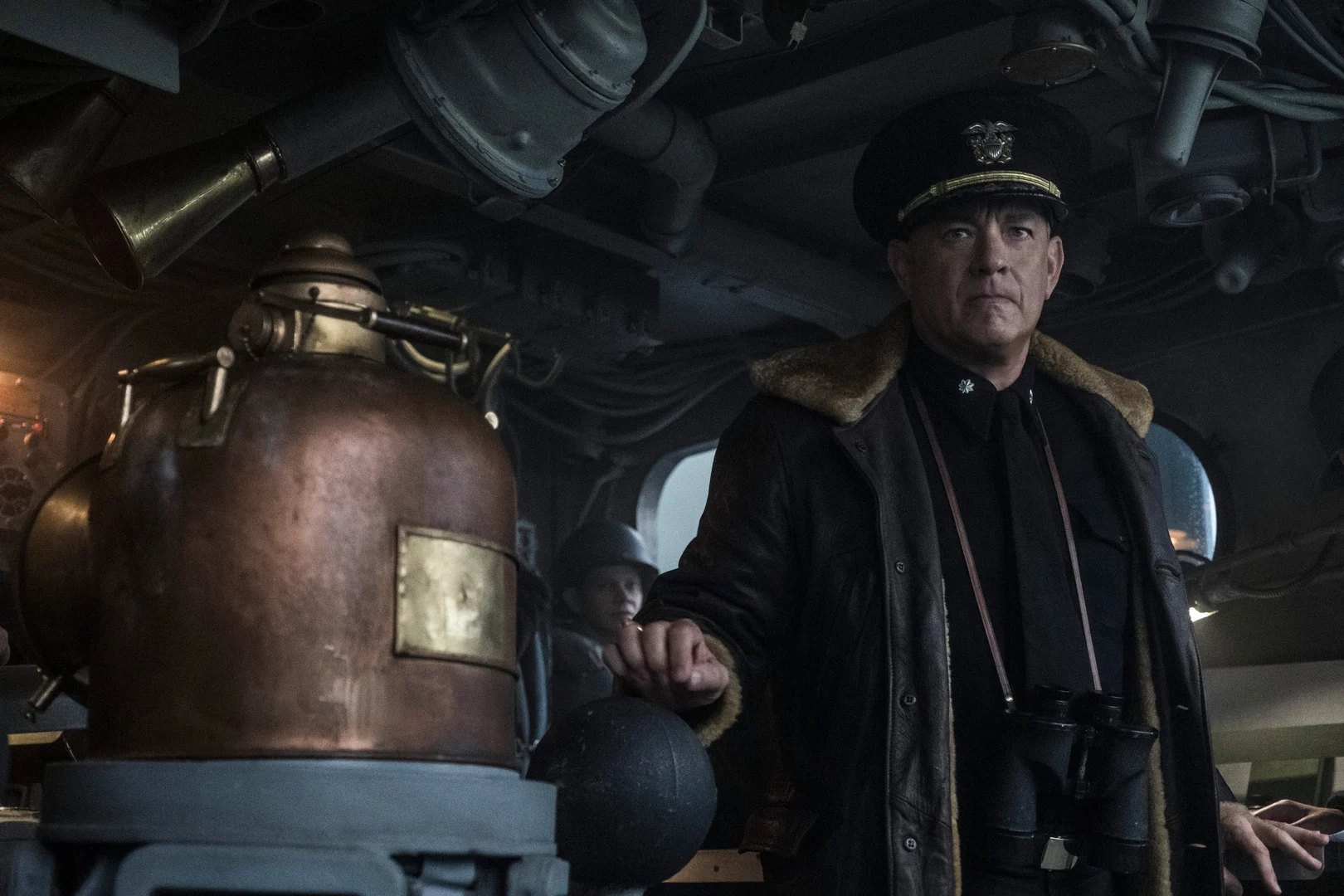 Official unit still — Commander Krause at the damaged bridge for Greyhound