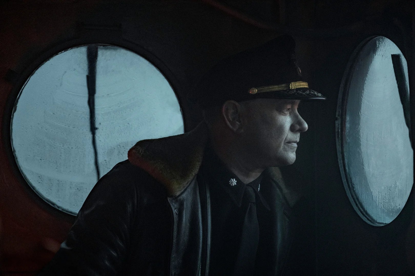 Official unit still — Commander Krause below deck for Greyhound