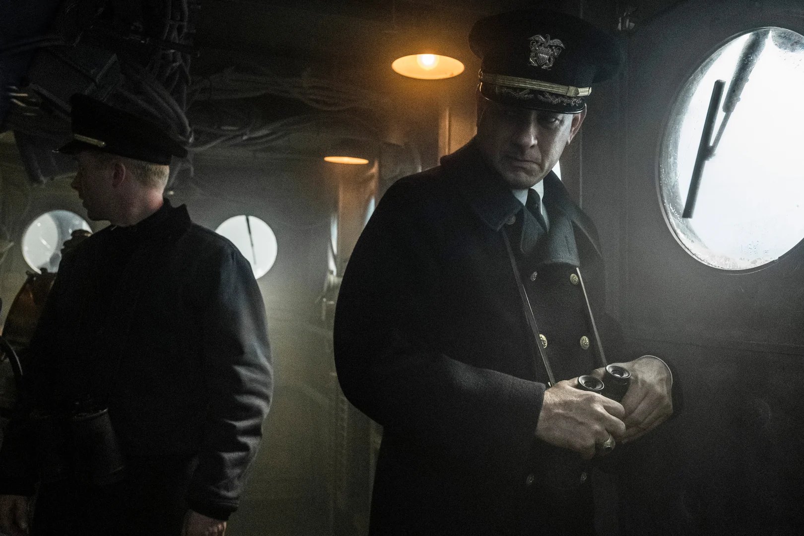 Official unit still — Commander Krause at the controls for Greyhound