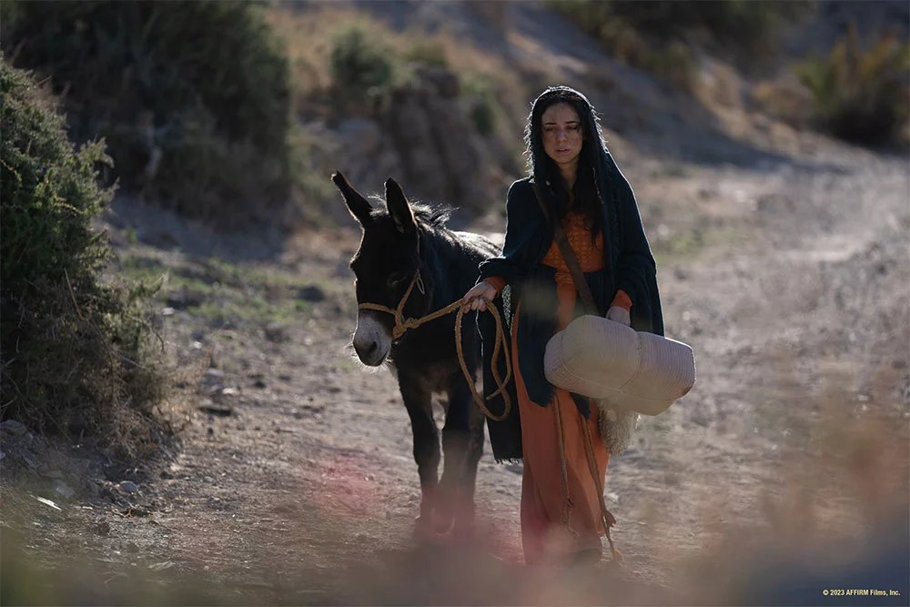 Official film still — Mary traveling with the donkey for Journey to Bethlehem